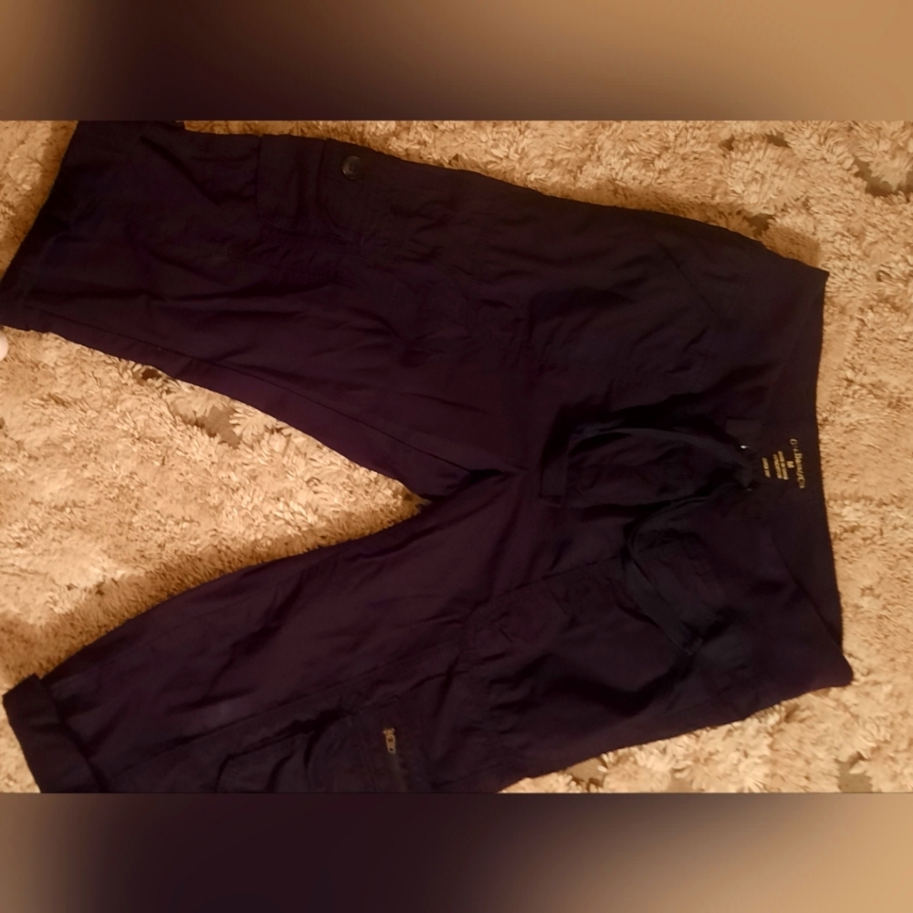 Bass button on bottom to roll up capris.